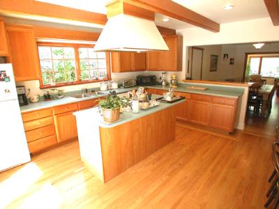 205 Butterfield Road San Anselmo, CA 94960 - Photo 4 of 6 a kitchen with stainless steel appliances granite countertop a sink and a stove