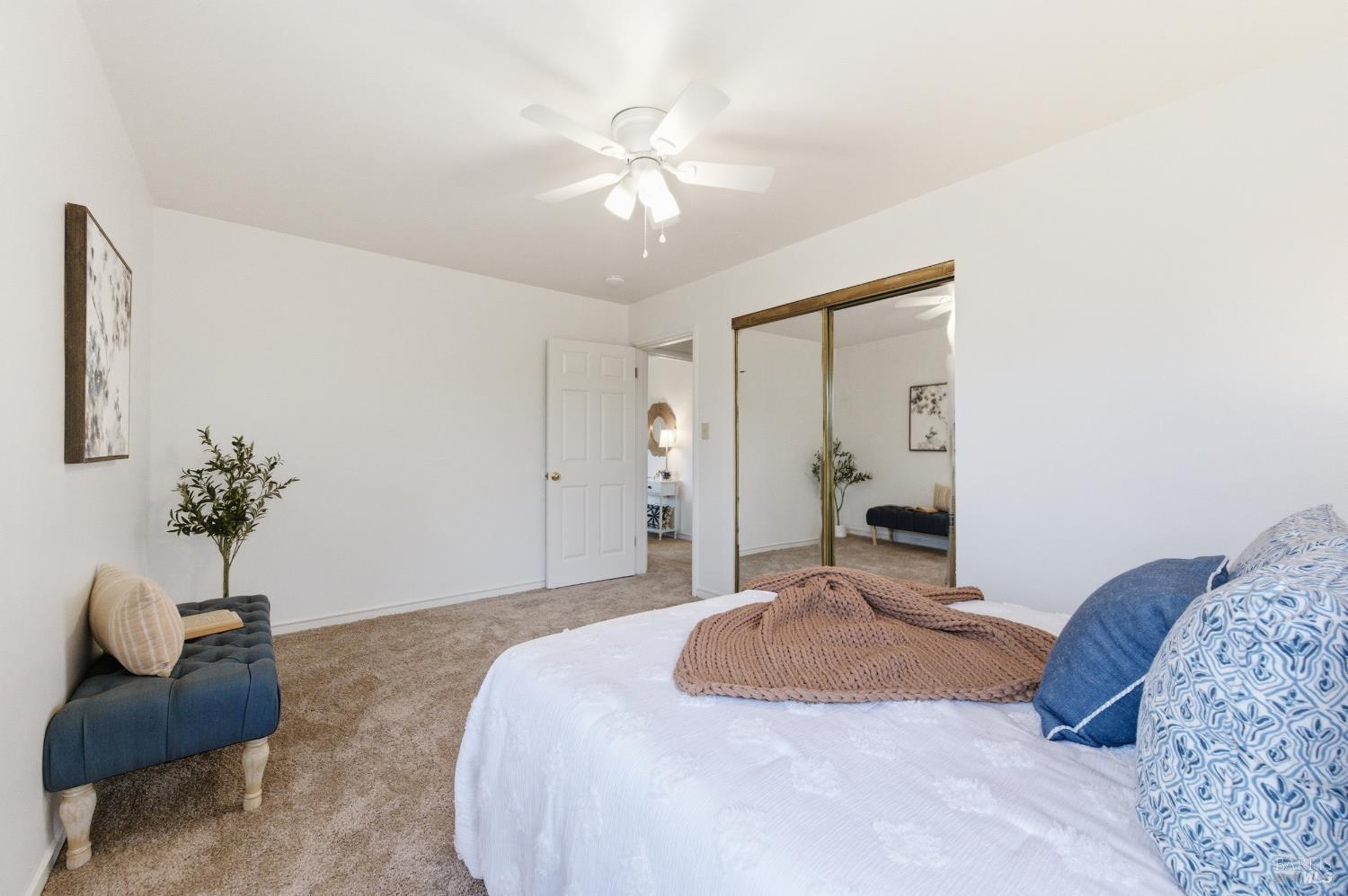 691 Annette Avenue Vallejo, CA 94591 - Photo 17 of 41 a bedroom with a large bed and a couch