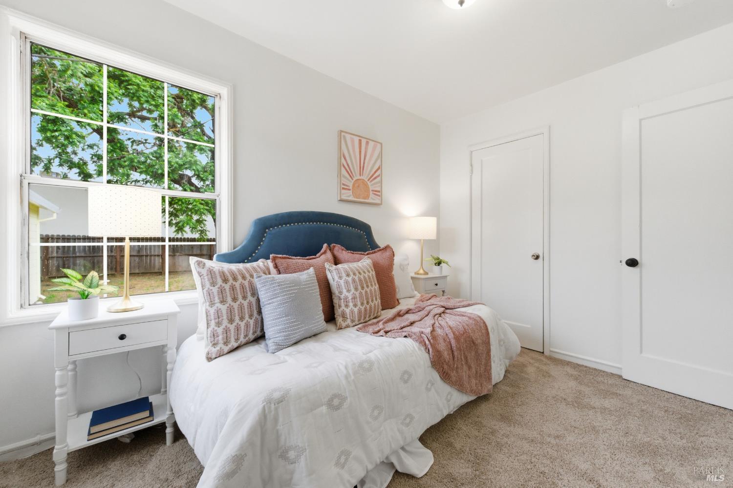 691 Annette Avenue Vallejo, CA 94591 - Photo 22 of 41 a bedroom with a bed and a window