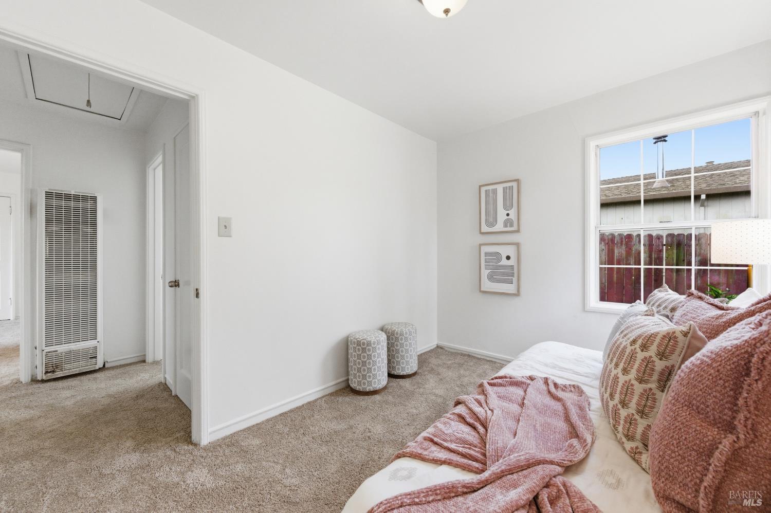 691 Annette Avenue Vallejo, CA 94591 - Photo 24 of 41 a bedroom with bed and a window