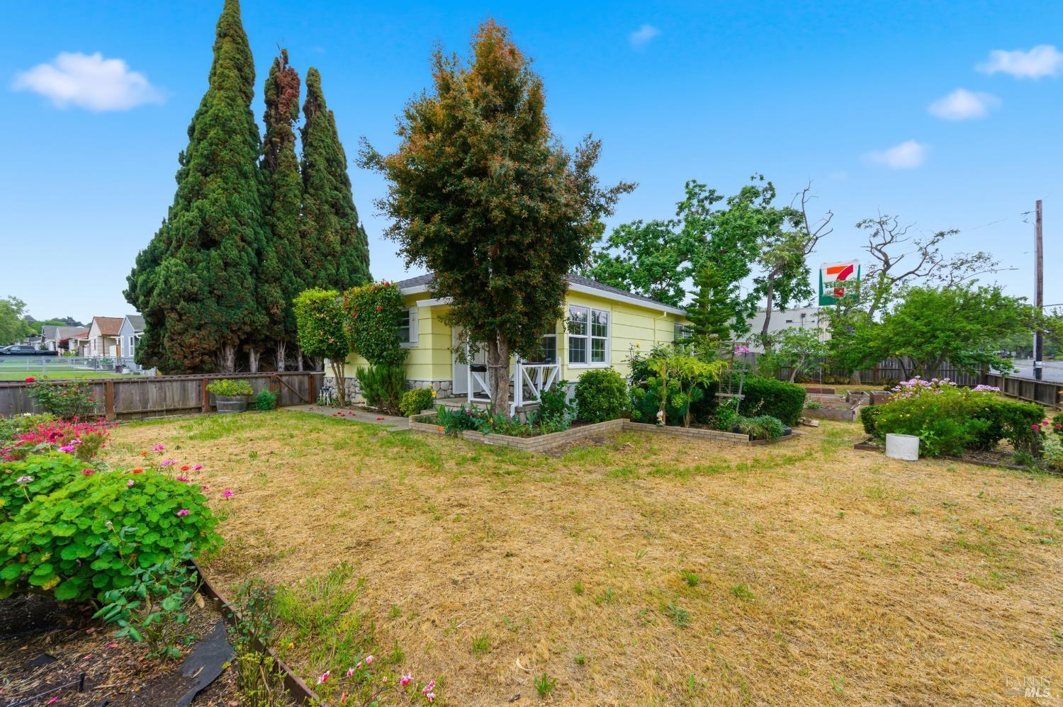 691 Annette Avenue Vallejo, CA 94591 - Photo 29 of 41 a view of a backyard with plants and a fountain