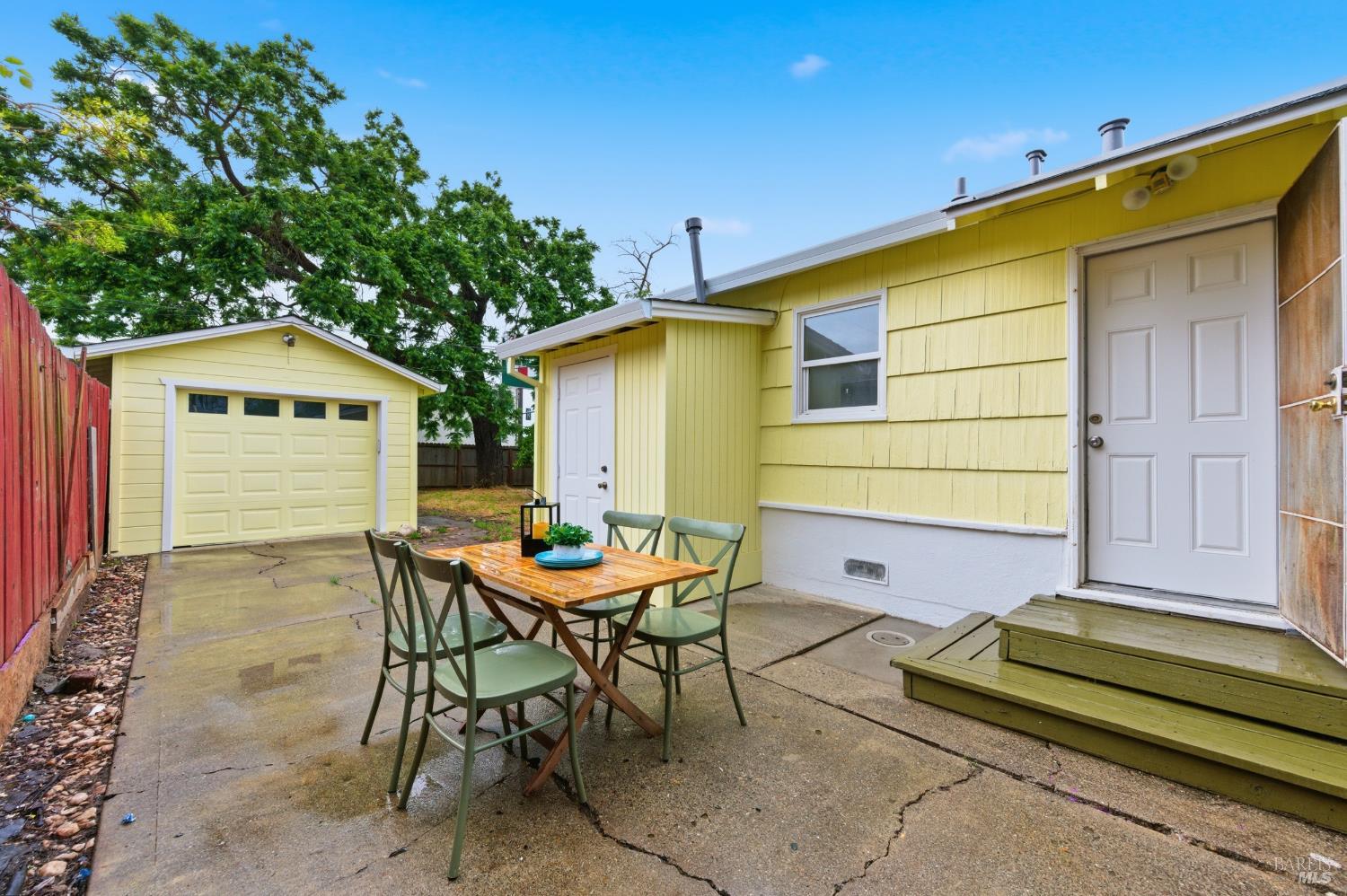 691 Annette Avenue Vallejo, CA 94591 - Photo 35 of 41 a backyard of a house with a table and chairs