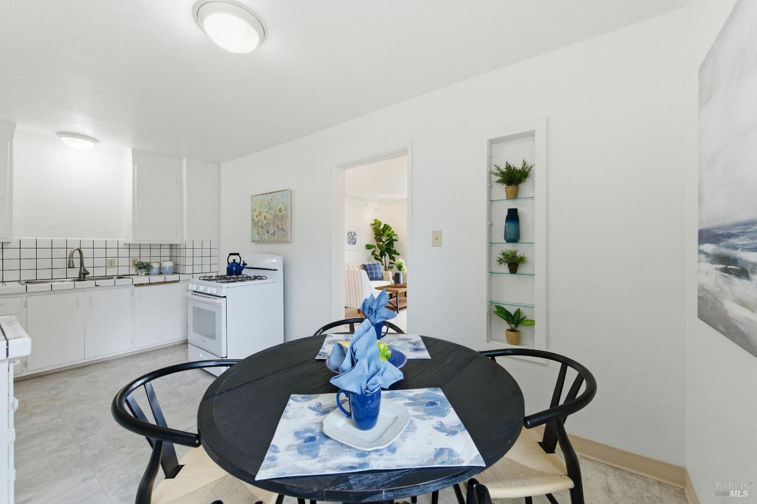 691 Annette Avenue Vallejo, CA 94591 - Photo 9 of 41 a dining room with furniture and wooden floor