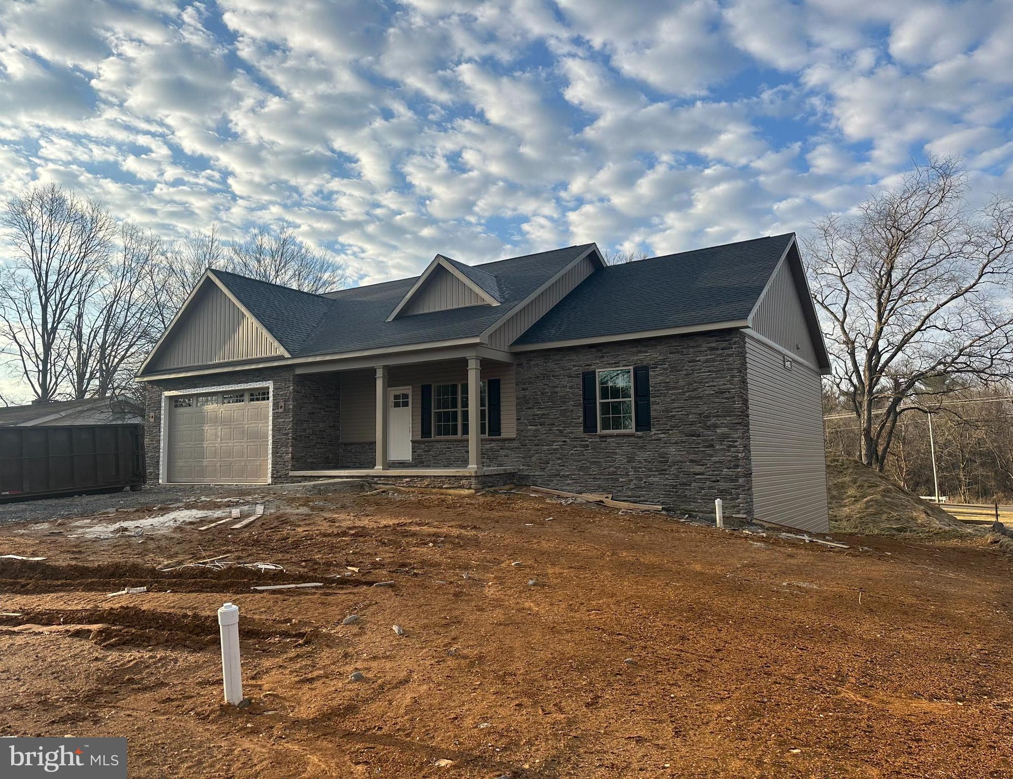 54 3rd Avenue Chambersburg, PA 17202 - Photo 2 of 8 a front view of a house with yard