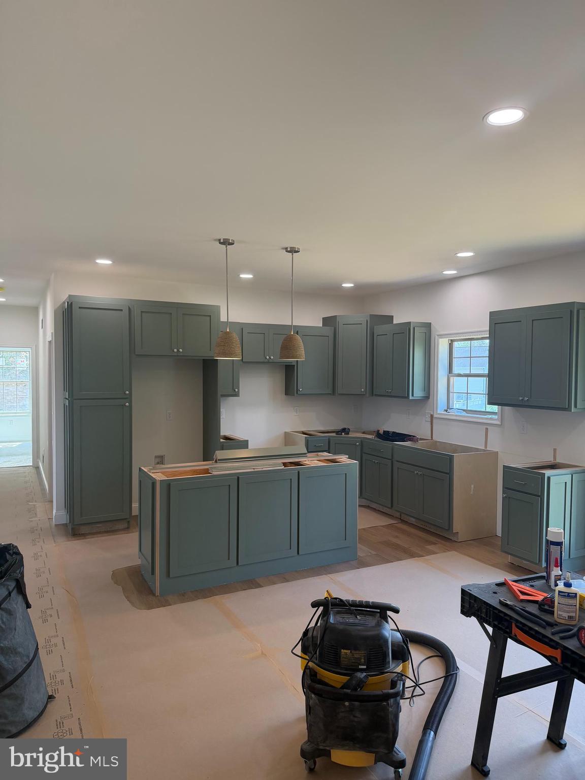 54 3rd Avenue Chambersburg, PA 17202 - Photo 6 of 8 a kitchen with stainless steel appliances kitchen island granite countertop a sink and a stove
