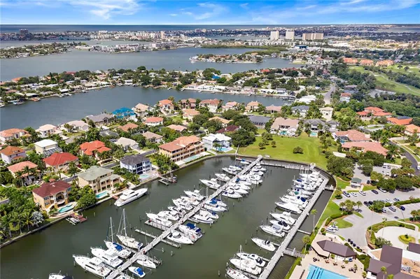 an aerial view of a city with lake view