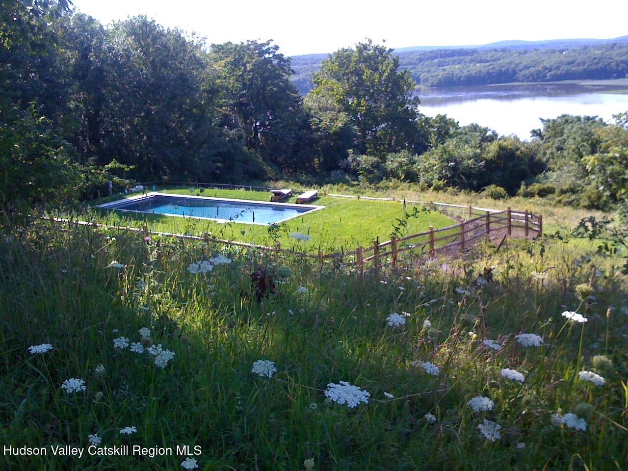 a view of a lake from a yard