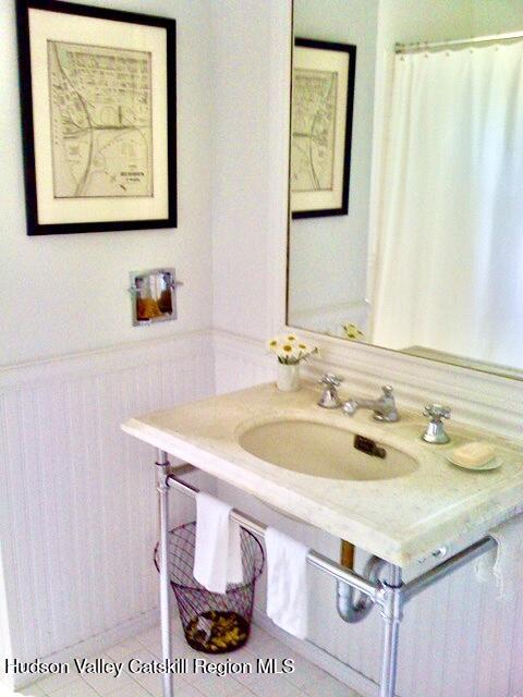 188 Mt Merino Road Hudson, NY 12534 - Photo 13 of 23 a bathroom with a sink and a mirror