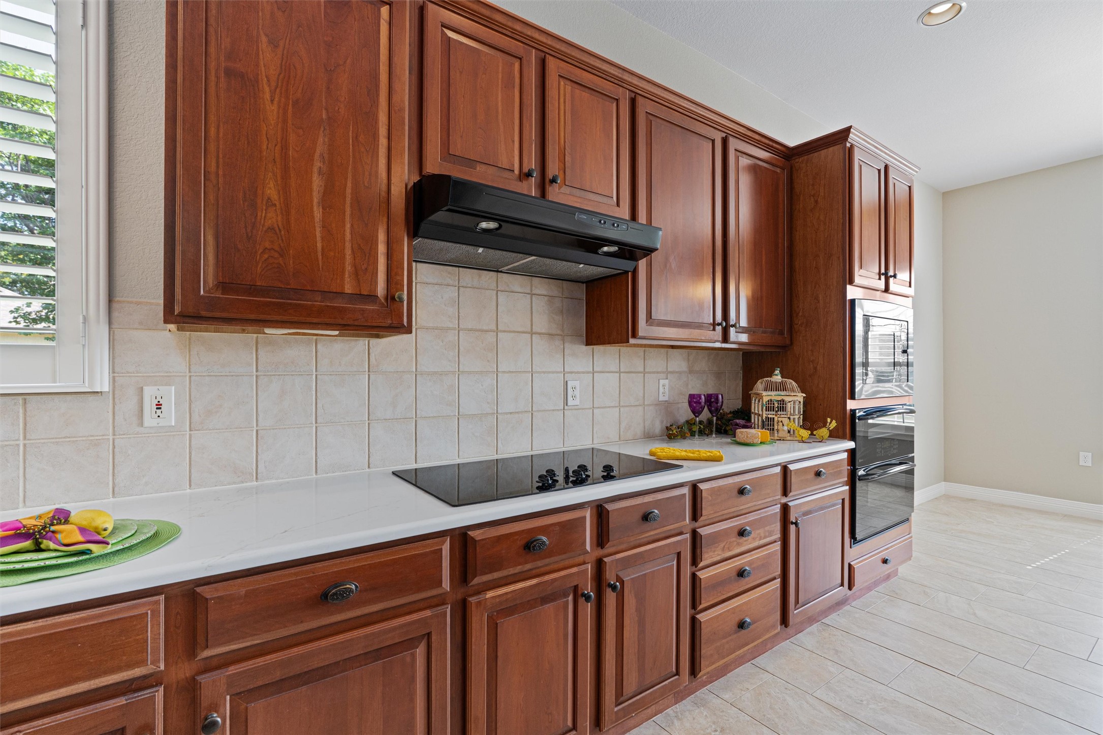 282 Trail Of The Flowers Georgetown, TX 78633 - Photo 13 of 38 a kitchen with granite countertop cabinets and steel stainless steel appliances