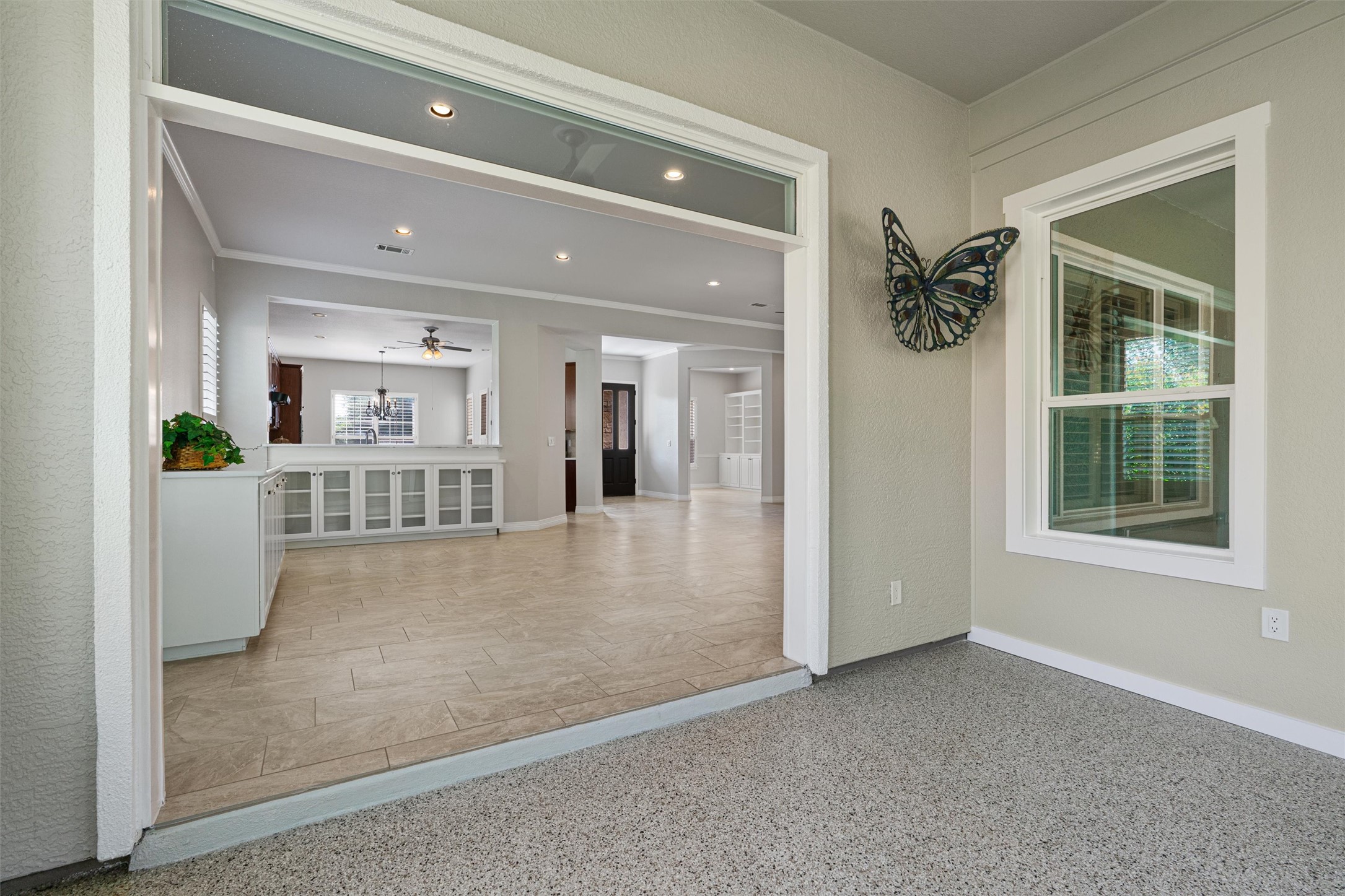 282 Trail Of The Flowers Georgetown, TX 78633 - Photo 29 of 38 an empty room that has a glass door and windows