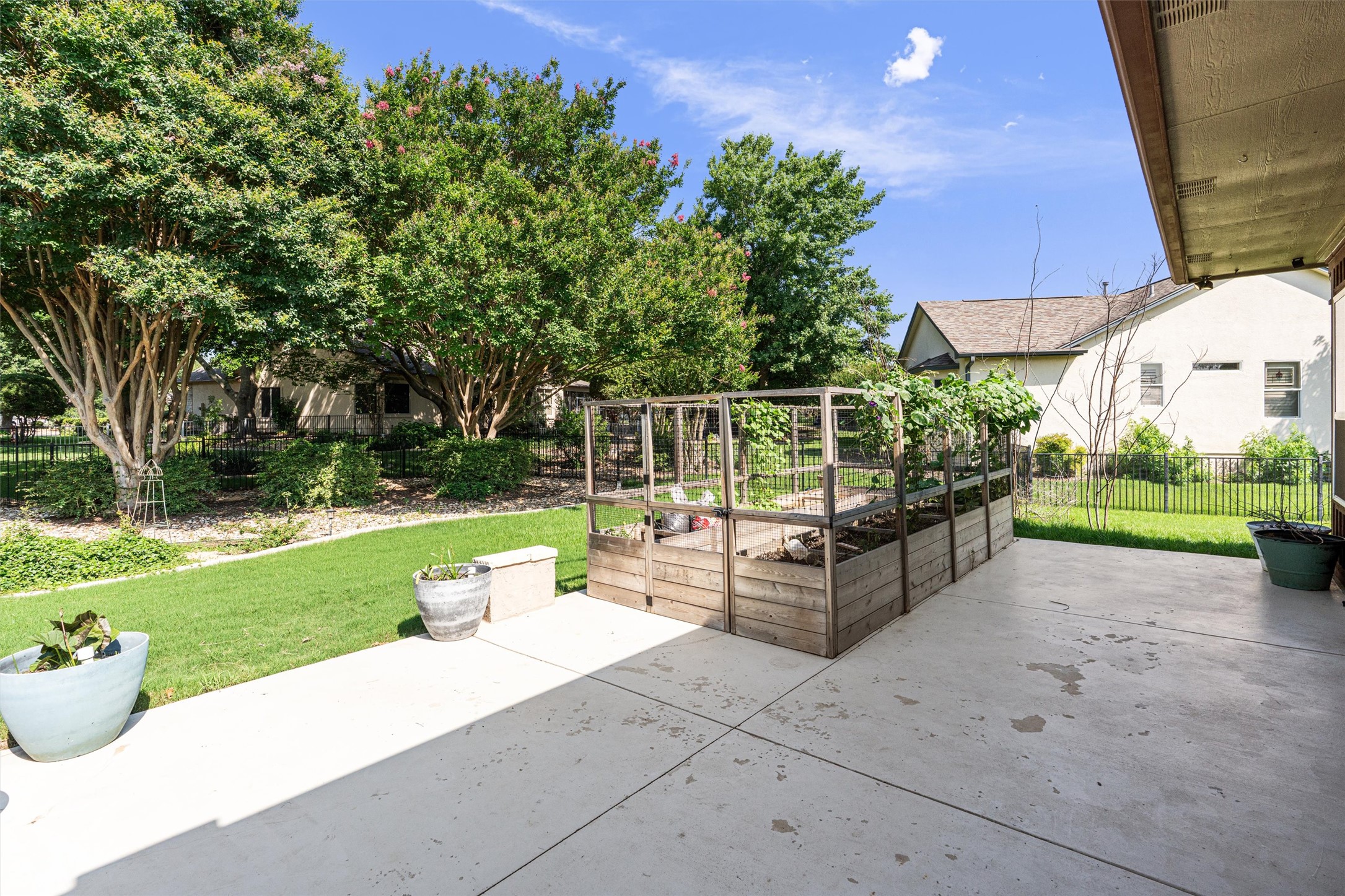 282 Trail Of The Flowers Georgetown, TX 78633 - Photo 33 of 38 a garden view with a seating space