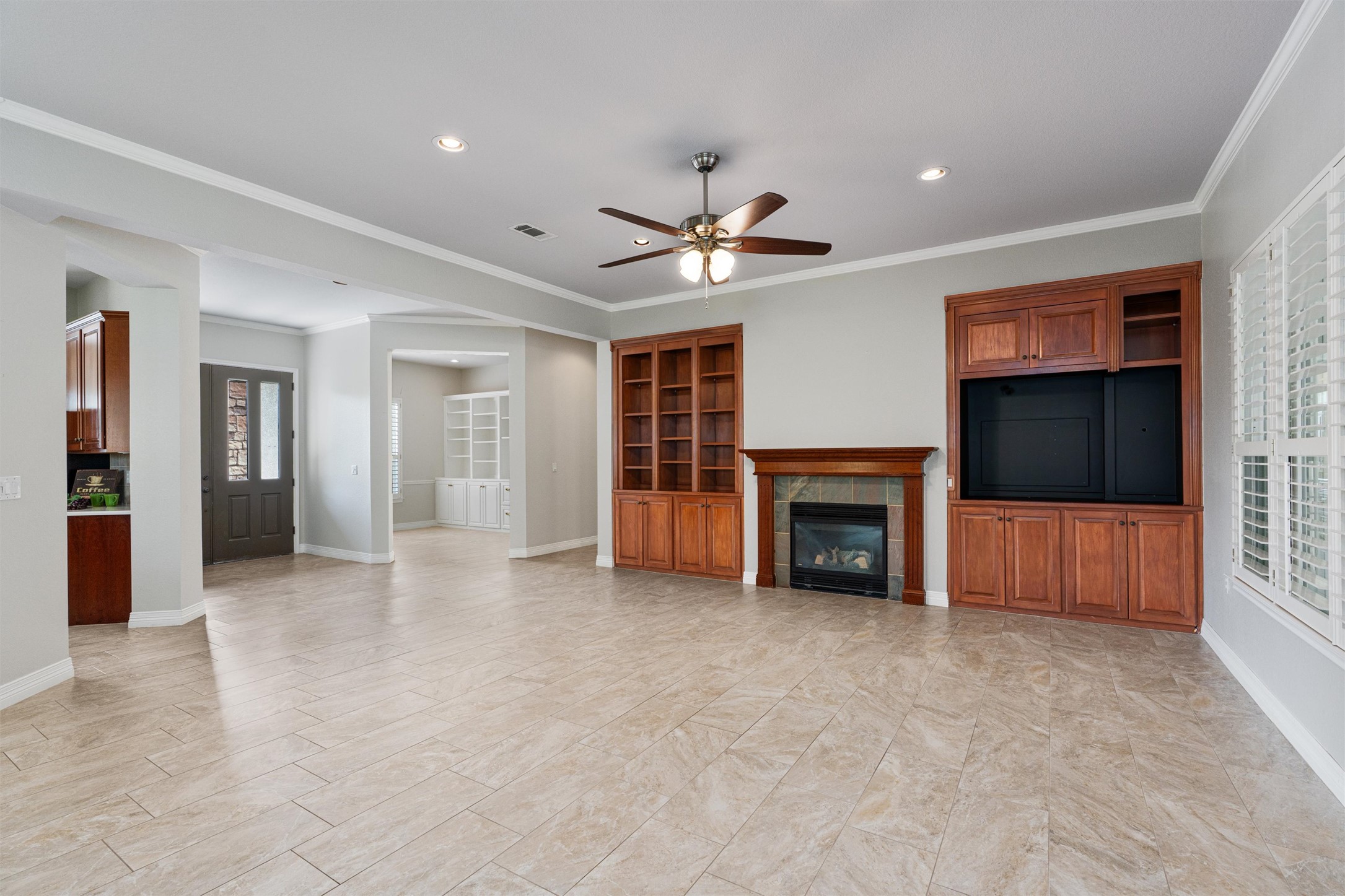 282 Trail Of The Flowers Georgetown, TX 78633 - Photo 5 of 38 a view of a livingroom with a fireplace and window