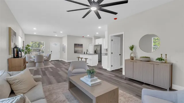 a living room with furniture and a window