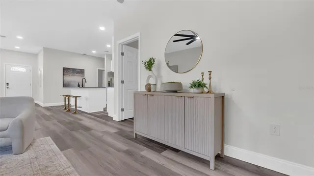 a living room with furniture and a rug