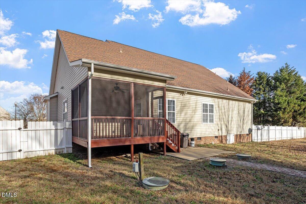 541 Spruce Meadows Lane Willow Spring, NC 27592 - Photo 38 of 40 a front view of a house with a yard