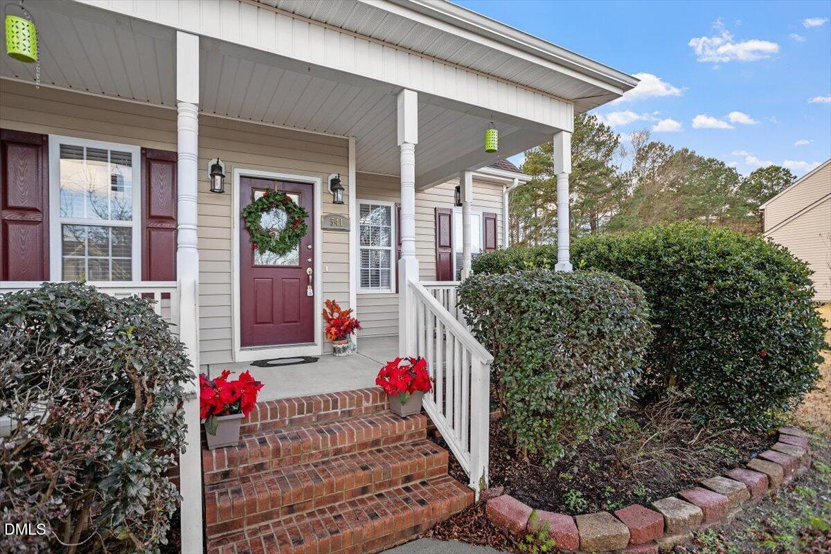 541 Spruce Meadows Lane Willow Spring, NC 27592 - Photo 4 of 40 a view of outdoor space and porch