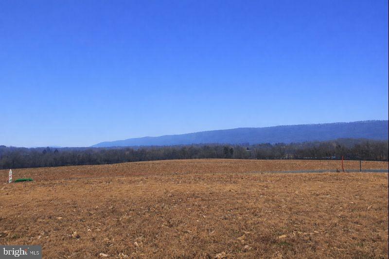 a view of ocean with sunset