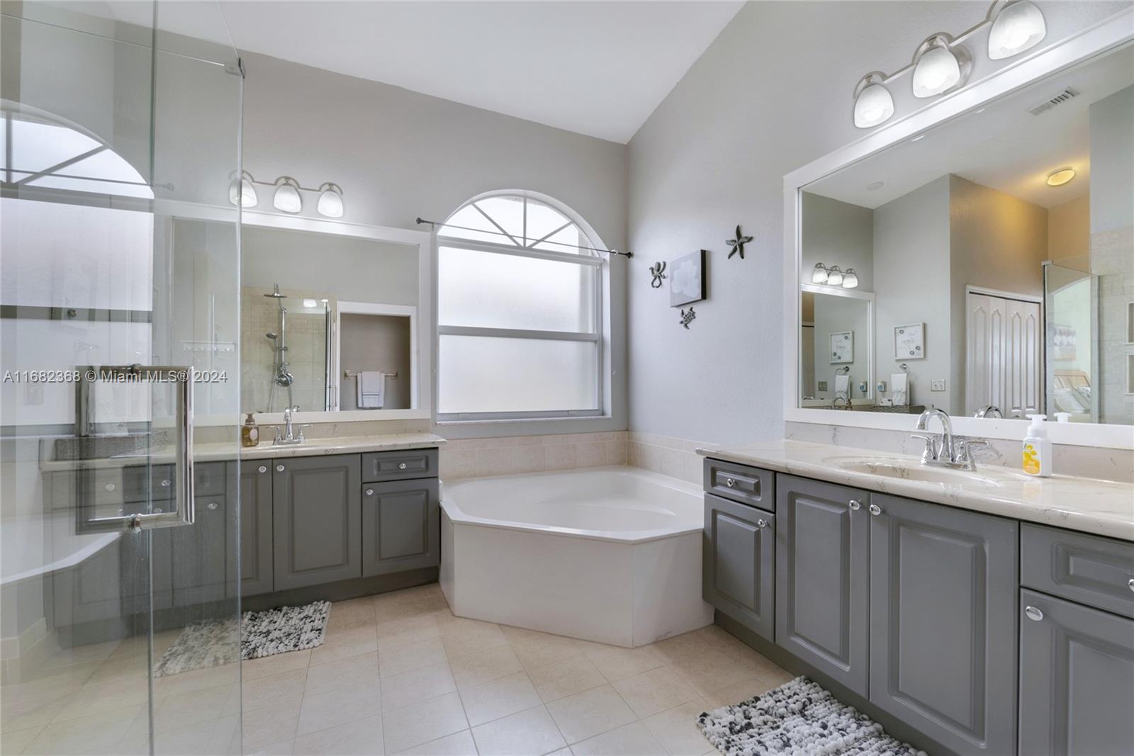 6850 Southwest 159th Place Miami, FL 33193 - Photo 12 of 18 a large kitchen with a large window