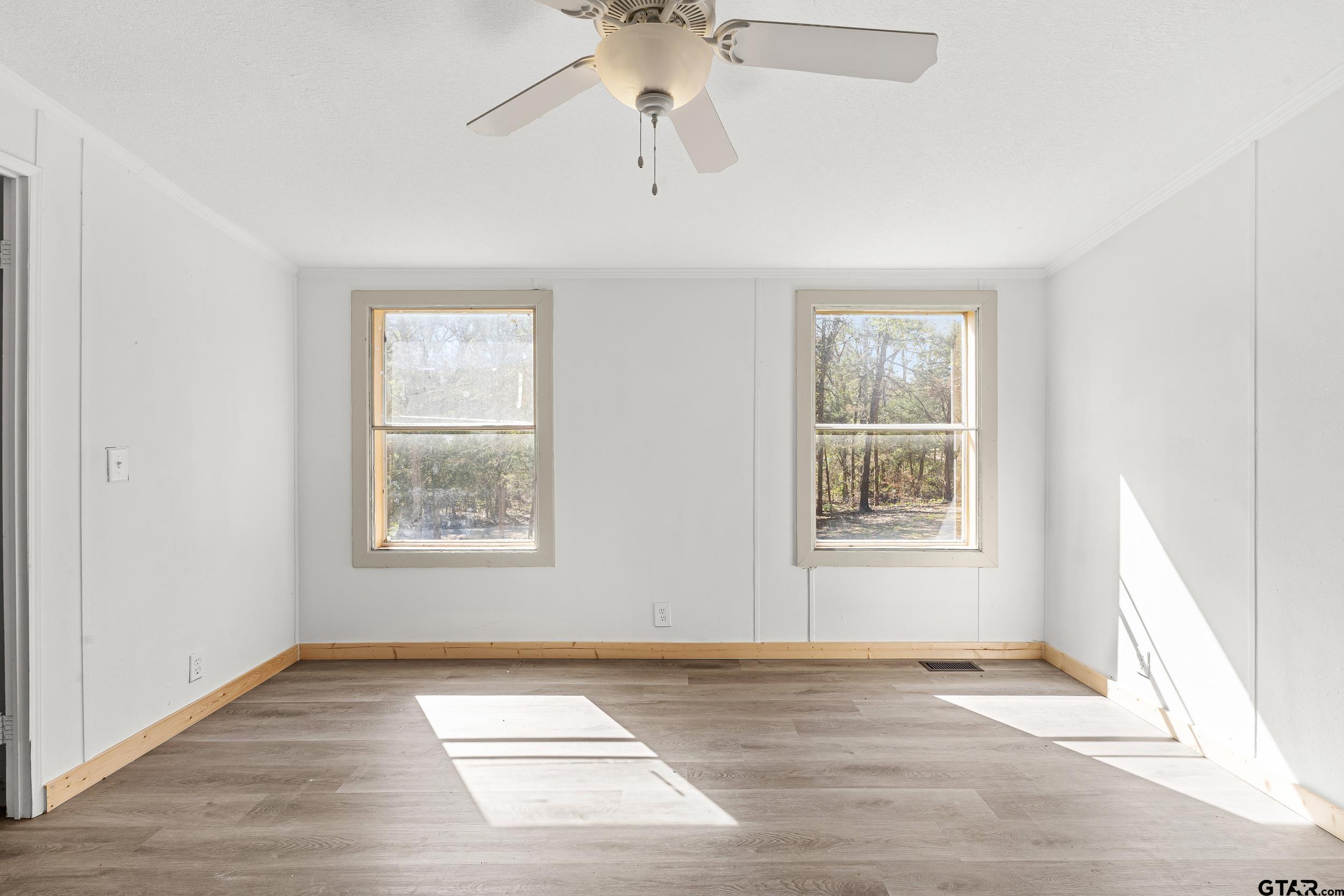 180 Southeast County Road Southeast Mount Vernon, TX 75457 - Photo 22 of 32 a view of an empty room with a window