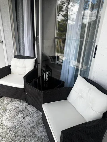 a kitchen with a sink and a refrigerator