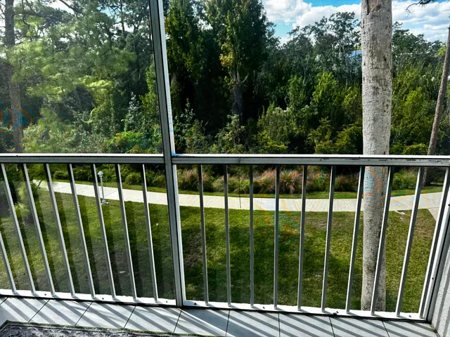 a view of a wooden fence