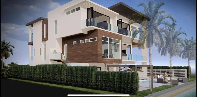 a view of a lake with houses in the back