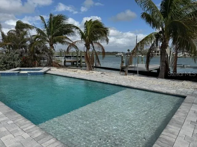 an aerial view of a with a table chairs