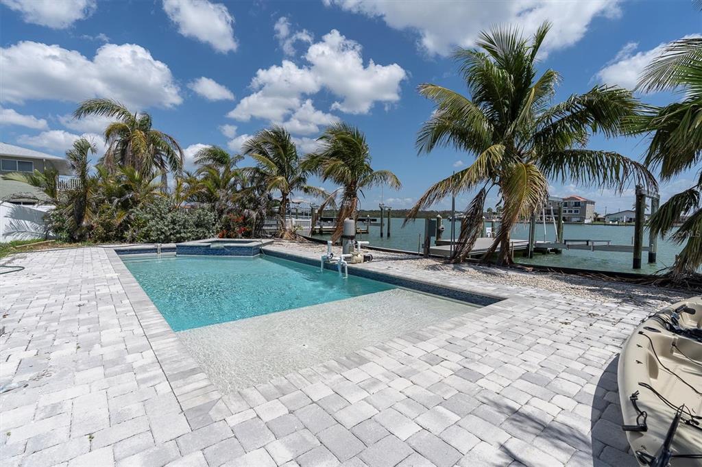 575 Crystal Drive Madeira Beach, FL 33708 - Photo 41 of 75 a view of outdoor space with trees
