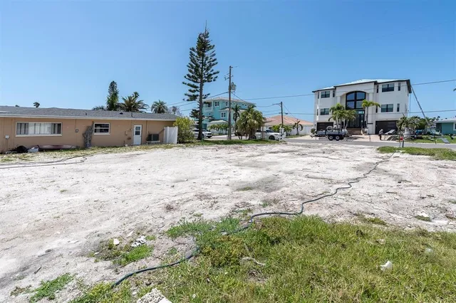 a view of swimming pool with seating space