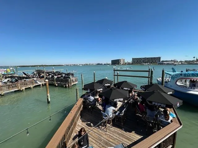 an aerial view of a house with lake view