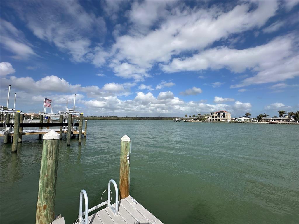 575 Crystal Drive Madeira Beach, FL 33708 - Photo 10 of 75 a view of a lake and yard