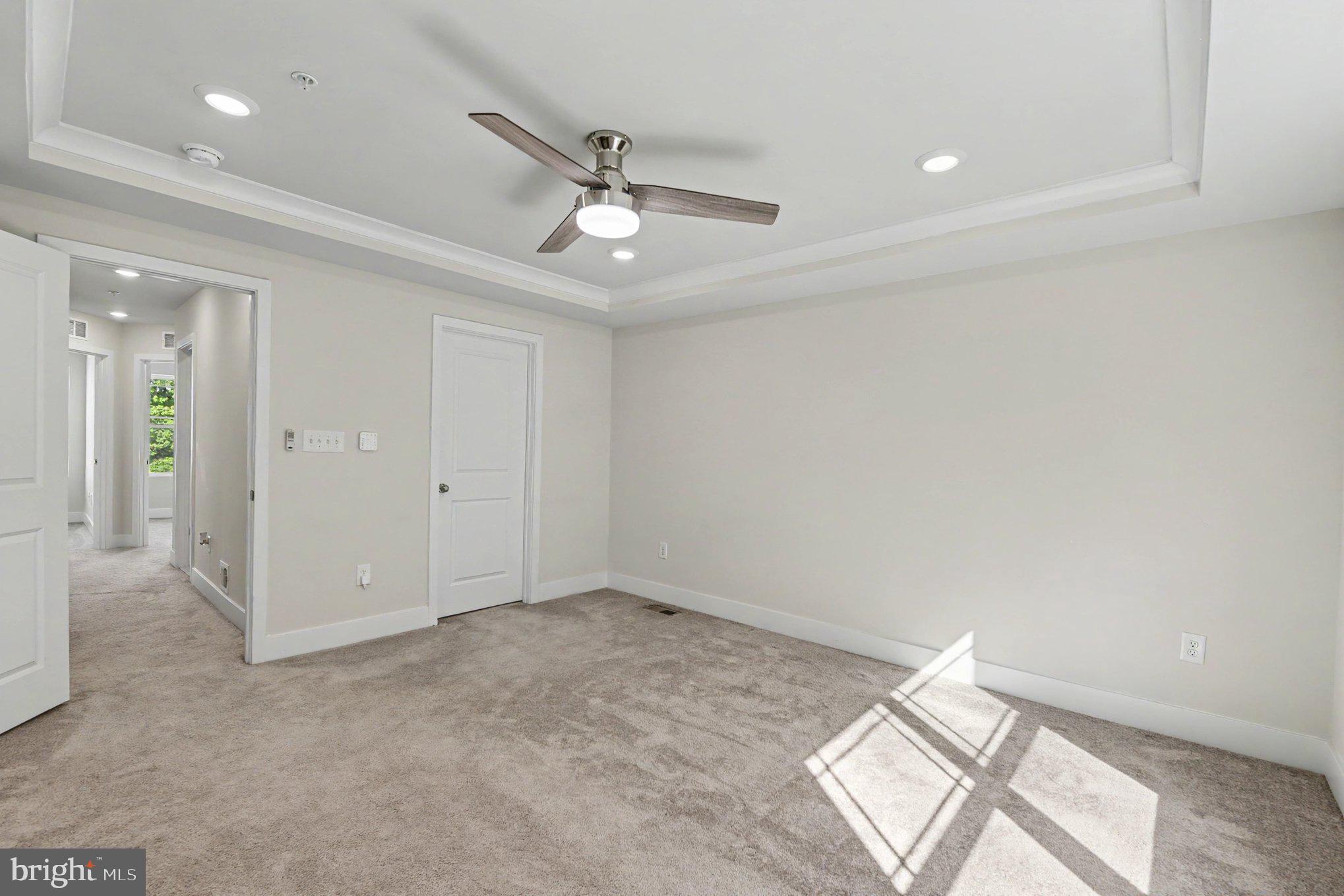 238 Waterstone Road Essex, MD 21221 - Photo 25 of 39 an empty room with fan and windows