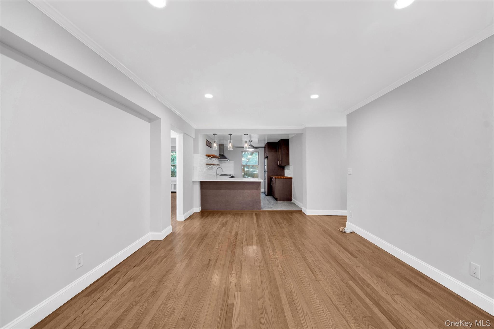 1 Vincent Road, Unit 2N Yonkers, NY 10708 - Photo 8 of 19 a view of a kitchen with wooden floor