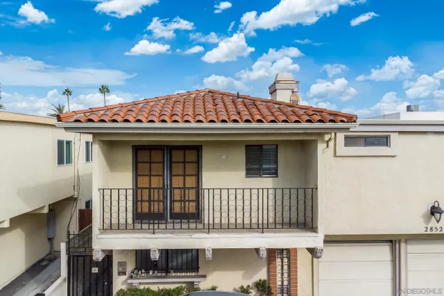 a view of a house with a balcony