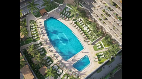 a view of a lake with lawn chairs