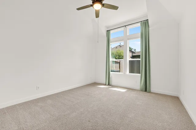 a view of a room with white walls