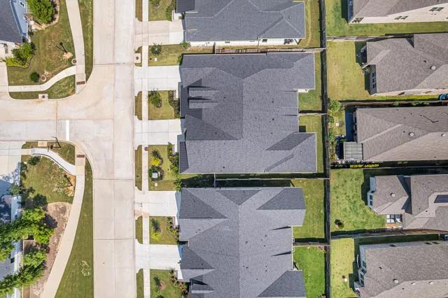 a view of a garden with patio