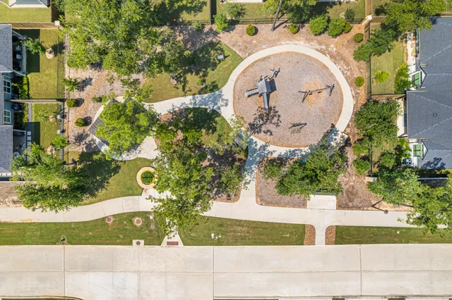 a view of a lake with a yard