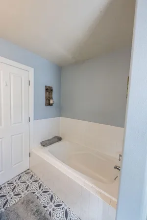 a bathroom with a bathtub