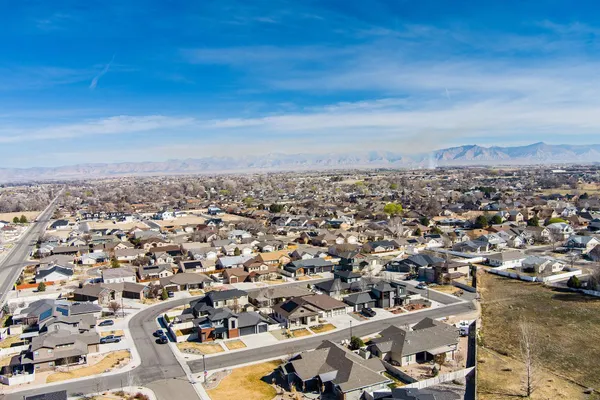 an aerial view of a city with lots of residential buildings