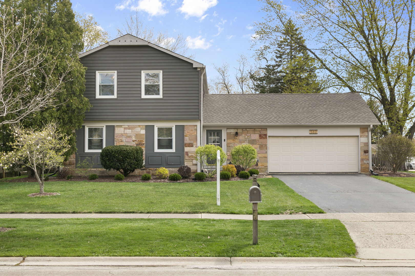 560 Checker Drive Buffalo Grove, IL 60089 - Photo 1 of 1 a front view of a house with a yard
