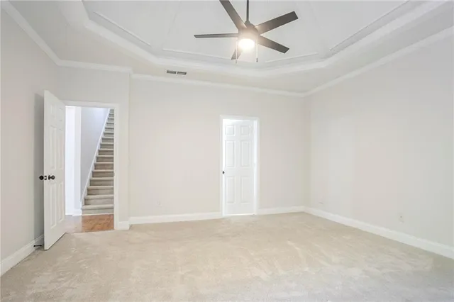 a spacious bathroom with a granite countertop tub sink and mirror