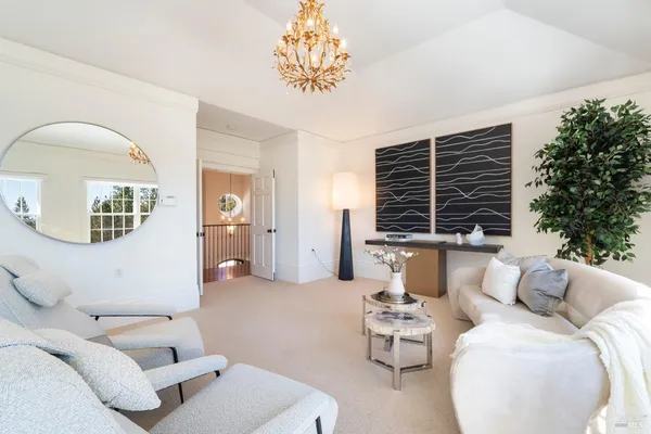 a living room with furniture and window