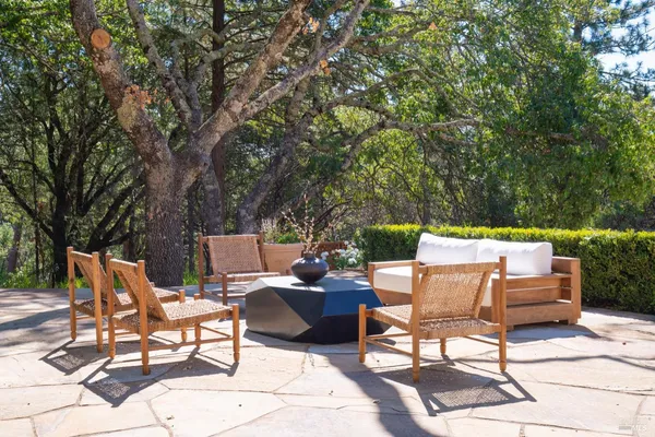 a view of a lounge chairs in the patio