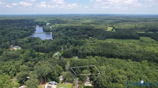an aerial view of residential house with outdoor space