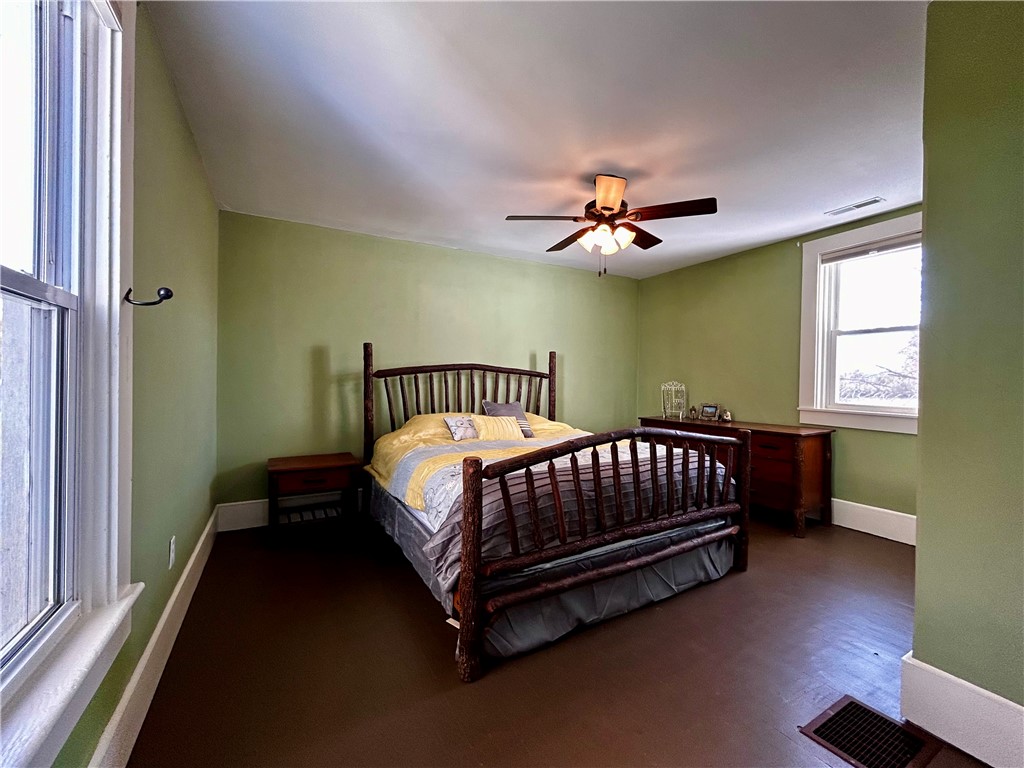 2086 Scheyhing Road Lewisburg, OH 45338 - Photo 15 of 29 This spacious bedroom offers ample natural light and a comforting ambiance for relaxation.