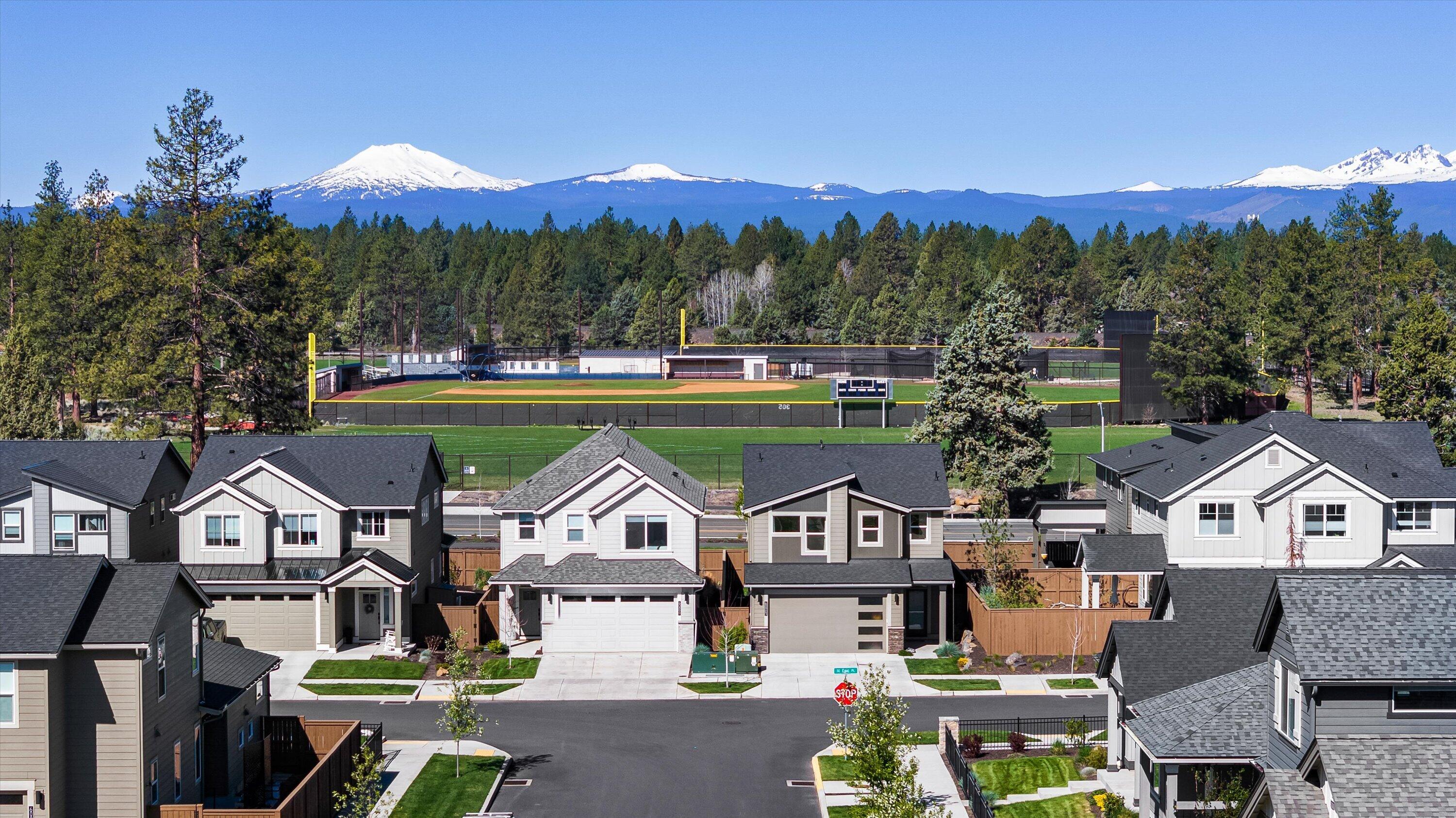 60903 Southeast Epic Place Bend, OR 97702 - Photo 2 of 48 a aerial view of a house with a garden