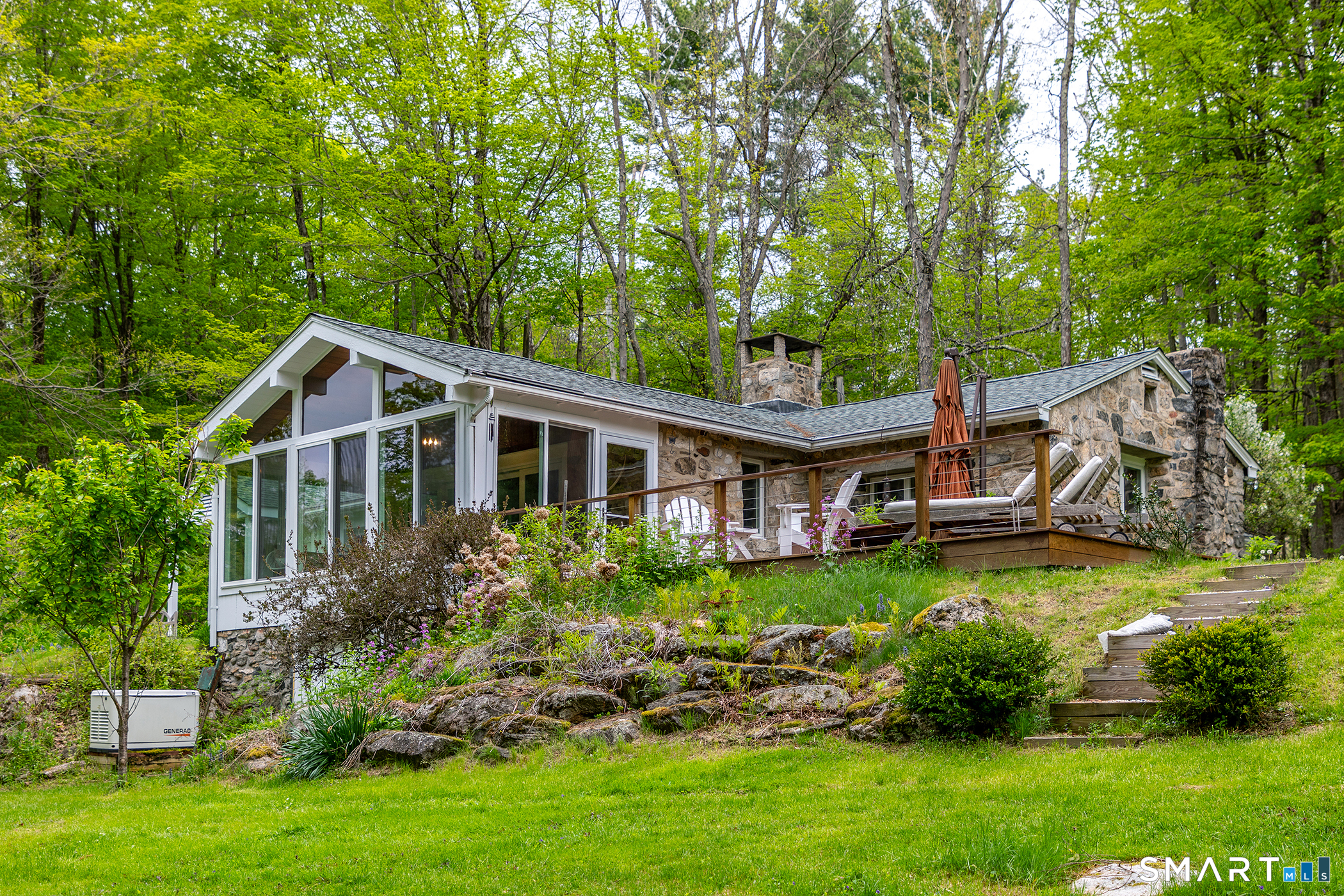 56 Todd Hill Road Cornwall, CT 06796 - Photo 1 of 30 Mature perennial gardens line the yard and the newer mahogany deck