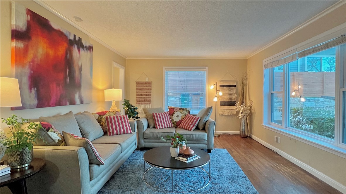 2103 Enfield Road, Unit A Austin, TX 78703 - Photo 1 of 1 a living room with furniture and a large window