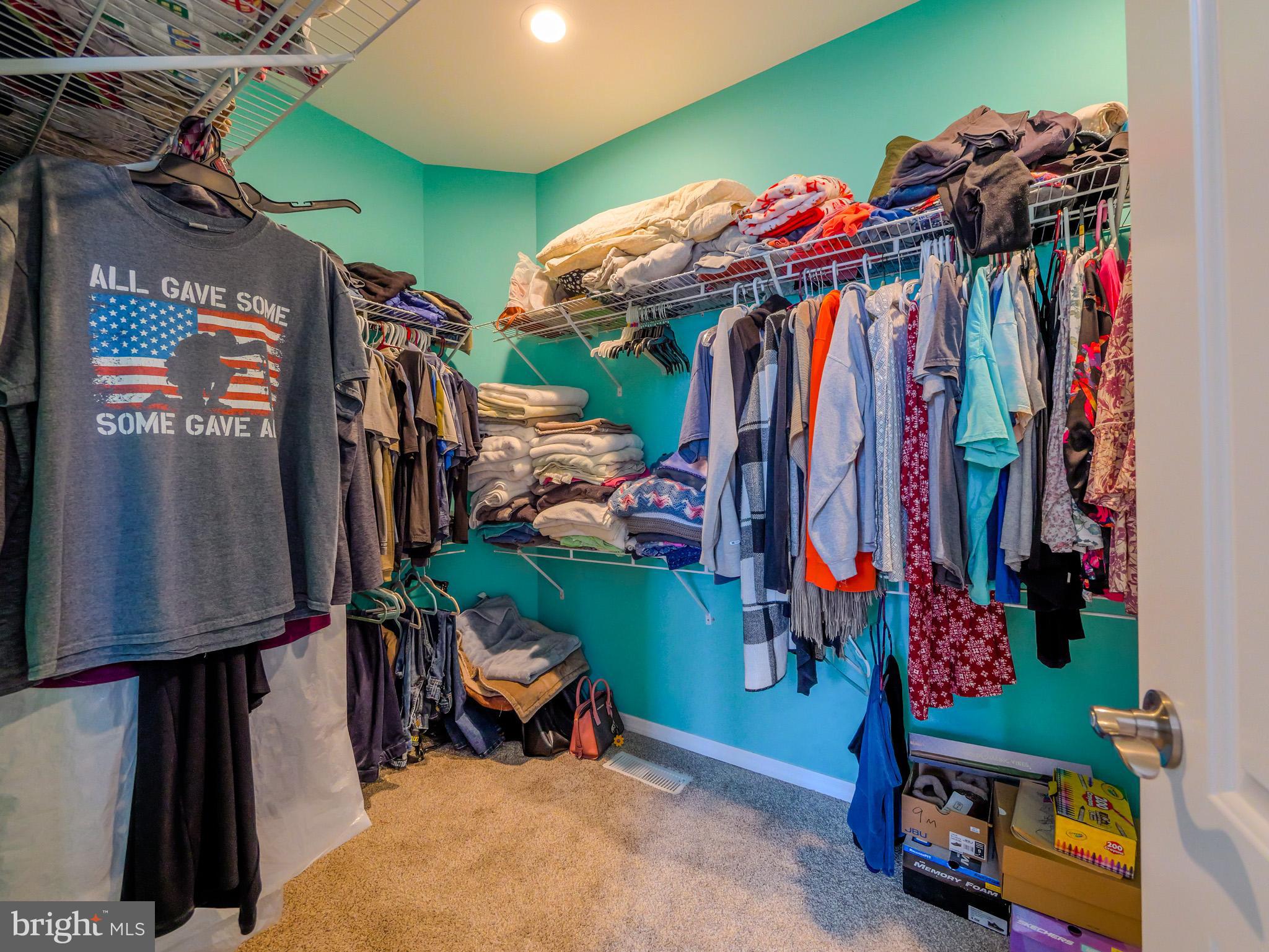 559 Franklinville Road Mullica Hill, NJ 08062 - Photo 21 of 41 a view of walk in closet with clothes and shoes